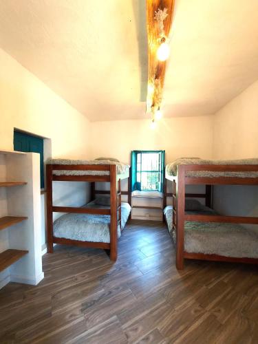 Una cama o camas en una habitación de Hacienda Tocarema