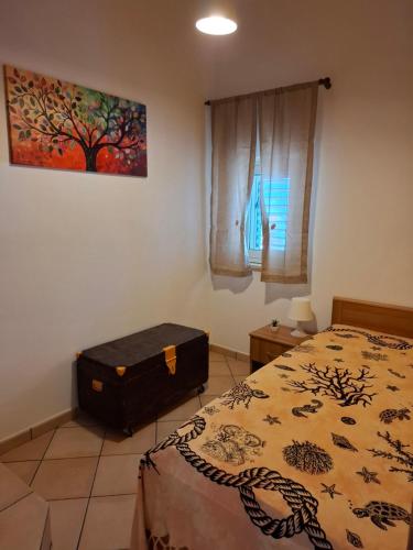 Postel nebo postele na pokoji v ubytování Casa Vacanze VILLA MELINA