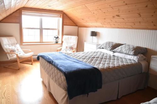 Postel nebo postele na pokoji v ubytování Acre By the Sea Guest Suite
