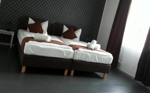 Ένα ή περισσότερα κρεβάτια σε δωμάτιο στο Lieth-Hotel-Grünreich