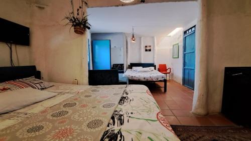 Postel nebo postele na pokoji v ubytování Hostal ROLLED