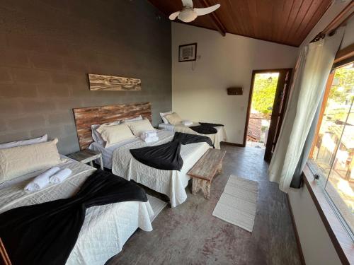 Ένα ή περισσότερα κρεβάτια σε δωμάτιο στο Guesthouse Casa da Aroeira