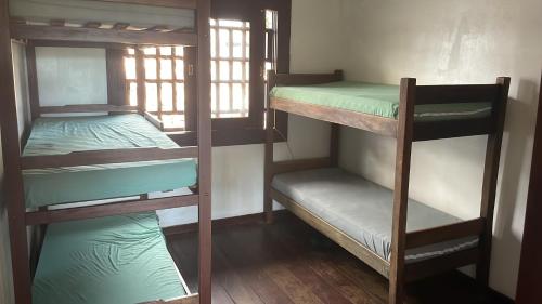 Postel nebo postele na pokoji v ubytování Hostel Jardim