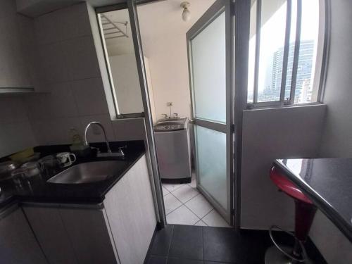 a small bathroom with a sink and a toilet at Depa El Polo, Embajada USA, Surco in Lima
