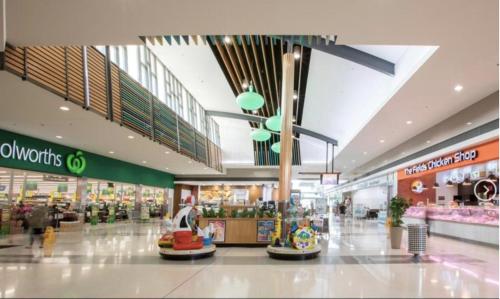 a shopping mall with a lot of stores at MJED House Australia in Ingleburn