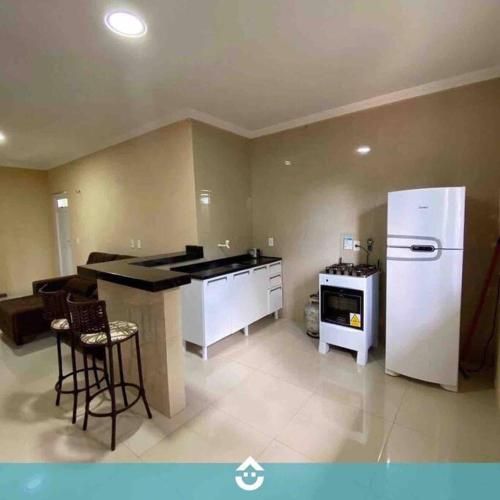 Kuchyň nebo kuchyňský kout v ubytování Apartamento mobiliado com 2 Quartos, estacionamento gratuito