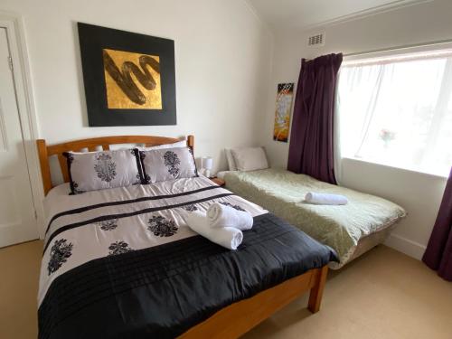 Katil atau katil-katil dalam bilik di Ellstanmor Guesthouse Cooma