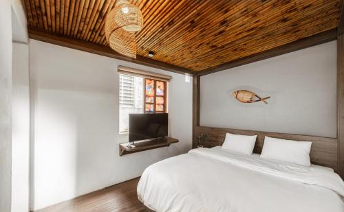 Ένα ή περισσότερα κρεβάτια σε δωμάτιο στο 3BR-BEST LOCATION-OLD QUATER-Walking street