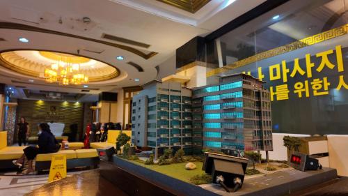 a lobby with a model of a building at Kay Hotel and Residences in Angeles