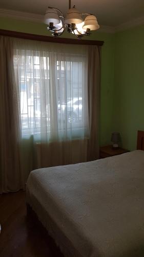 Postel nebo postele na pokoji v ubytování When in Tbilisi