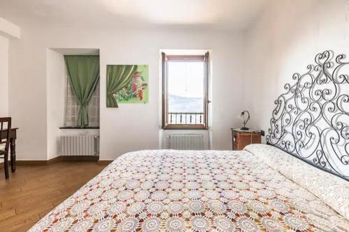 A bed or beds in a room at Bed & Breakfast L'erica