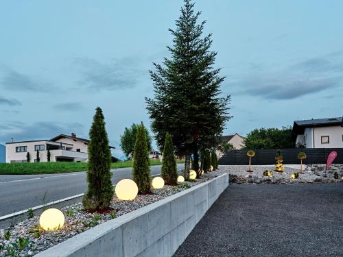 a christmas tree on the side of a road at Lelis Alpenloft - Bergchalet in Halden in Mittelberg