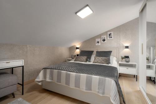 a bedroom with a large bed in a room at Apartment Vala Vrsar in Vrsar
