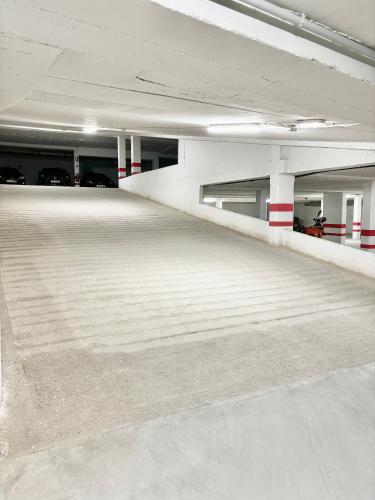 an empty parking lot in an empty parking garage at Suites La Catedral in León