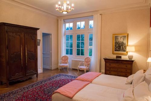 Postel nebo postele na pokoji v ubytování Le Manoir de Bénédicte B&B