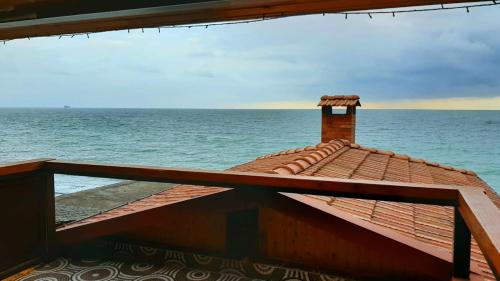 a view of the ocean from the roof of a house at Our home in Chakvi