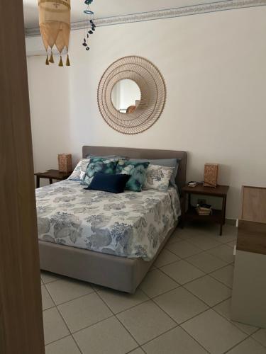 Ένα ή περισσότερα κρεβάτια σε δωμάτιο στο Terrazza SoleLuna