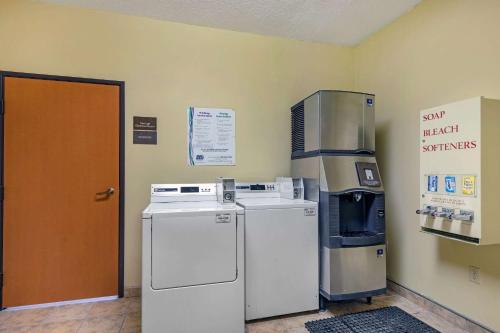a room with a refrigerator and a water dispenser at Comfort Suites McKinney-Allen in McKinney