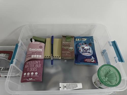 a drawer with some food and other items in it at Best 3BHK Premium Homestay - Onyx, 7 Elysee Homestay in Trichūr