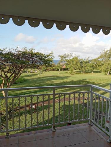 Balkón nebo terasa v ubytování TROPIC Appartements PREMIUM village vacances vue mer Guadeloupe St Anne