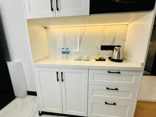 Dapur atau dapur kecil di Rose Point Residence