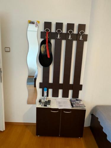 a room with a bed and a wall with at Ana & Patrik #1 in Kladovo