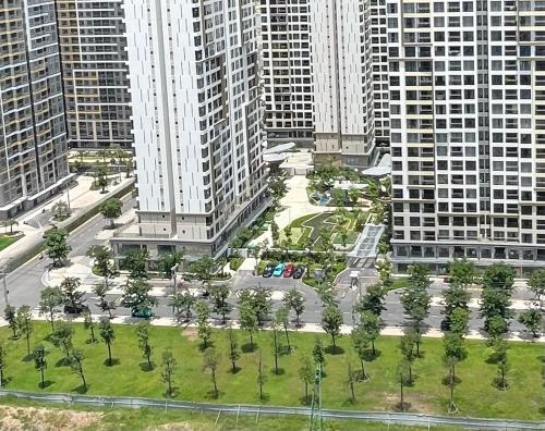 an aerial view of a city with tall buildings at Căn hộ VINHOMES GRAND PARK, Hồ Chí Minh city in Long Bình