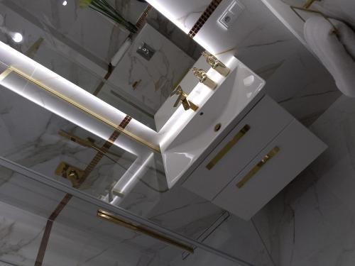 Koupelna v ubytování Okuninka Palace