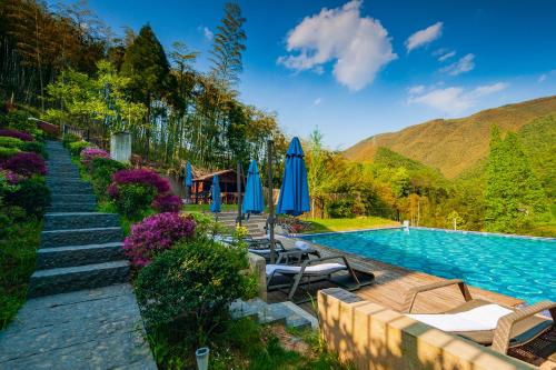 Bazén v ubytování Moganshan Arcadia Resorts nebo v jeho okolí