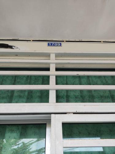 a sign on the side of a building at Homestay NAQ D' Kuala Kangsar in Kuala Kangsar