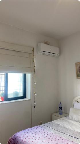 Un ou plusieurs lits dans un hébergement de l'établissement Quarto em Malta
