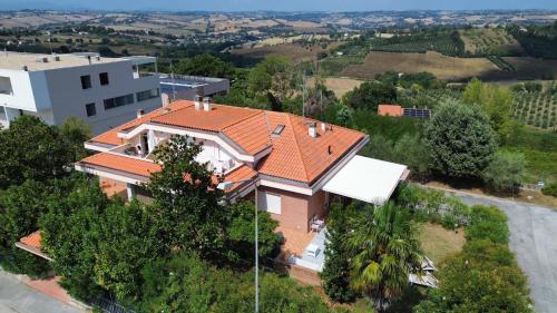 an aerial view of a house with an orange roof at La Principessa Nera B&B in Ostra