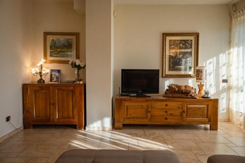 Televisyen dan/atau pusat hiburan di Villa Mara - Aosta - 200 mq - WiFi - Jacuzzi - Parcheggio - Giardino