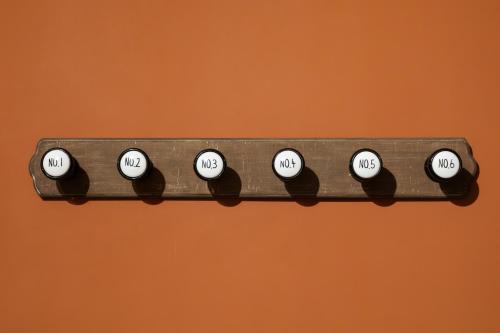 a row of buttons with the time on them at Gîte touristique Vivaccueil Binche in Binche