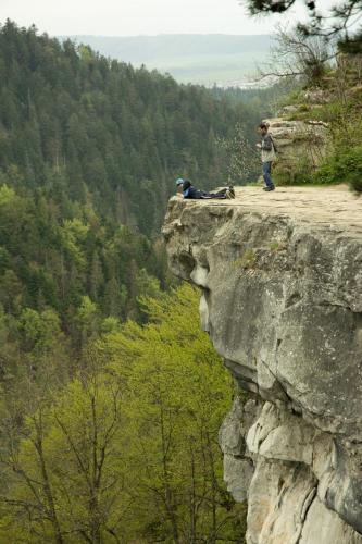 a person standing on the edge of a cliff at Ubytovanie U Mirca in Nová ľubovňa