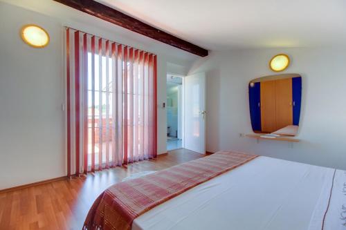 Postel nebo postele na pokoji v ubytování Ruzica