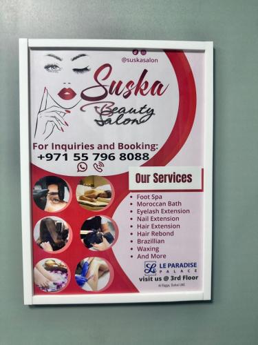 a poster for a beauty shop with a price list at Le Paradise Palace Hotel Deira Dubai Al Rigga in Dubai