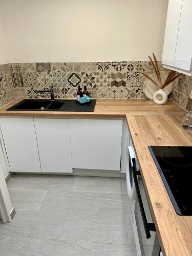 Η κουζίνα ή μικρή κουζίνα στο Maison hyper centre Jacuzzi