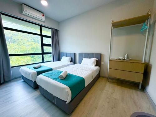 Ένα ή περισσότερα κρεβάτια σε δωμάτιο στο Sunset Seaview Vacation Condos @ Jesselton Quay