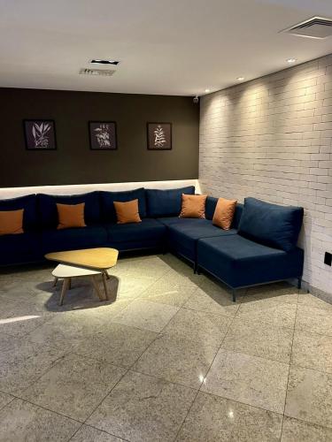 Χώρος καθιστικού στο Cosmopolitan PRAIA Flat com Estacionamento Grátis - Gonzaga - Ap 76