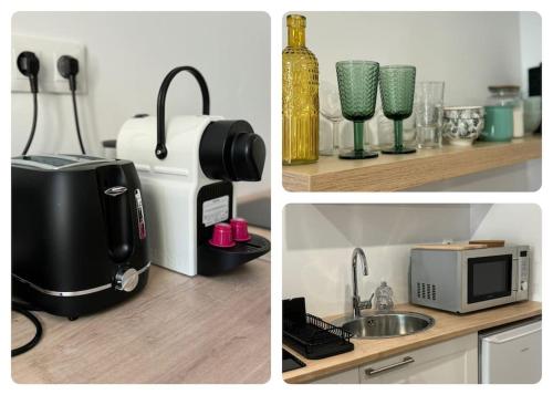 a kitchen with a microwave and a coffee maker at Bel forest , Climatisé, terrasse in Belfort