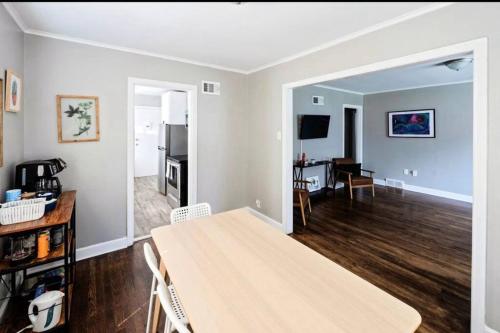 a living room with a table and a dining room at E, Memphis Home 5 min from I240W in Memphis