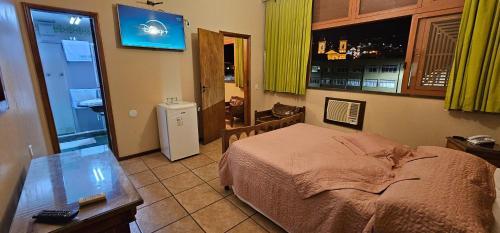 Katil atau katil-katil dalam bilik di Hotel Ponte Real