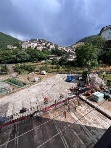 a large parking lot with buildings in the background at Casa Serena in Scanno