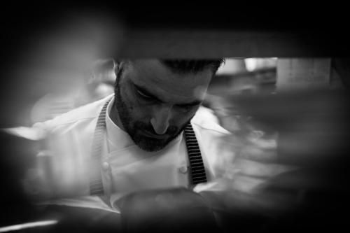 a man wearing a white shirt and a tie at Hotel Villa Gabrisa in Positano