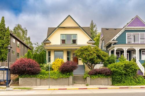 a row of houses on a city street at Charming Capitol Hill Craftsman in Seattle