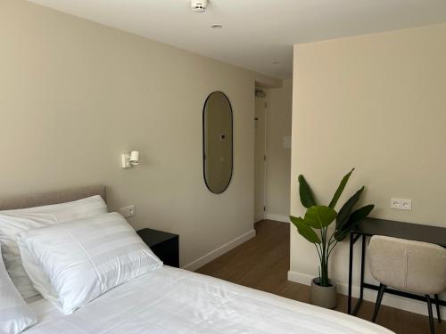 Katil atau katil-katil dalam bilik di Hotel de Slapende Hollander