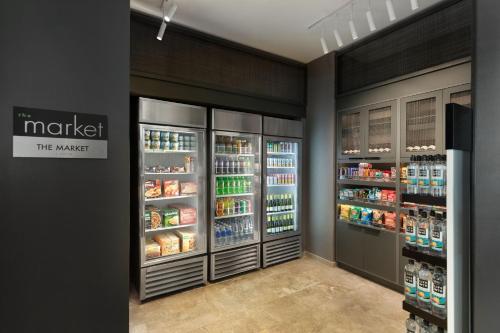 a grocery store aisle with two refrigerators at Residence Inn by Marriott Boston Back Bay/Fenway in Boston