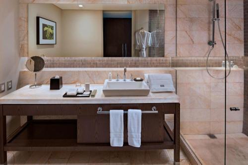 a bathroom with a sink and a shower at The Westin Santa Fe, Mexico City in Mexico City