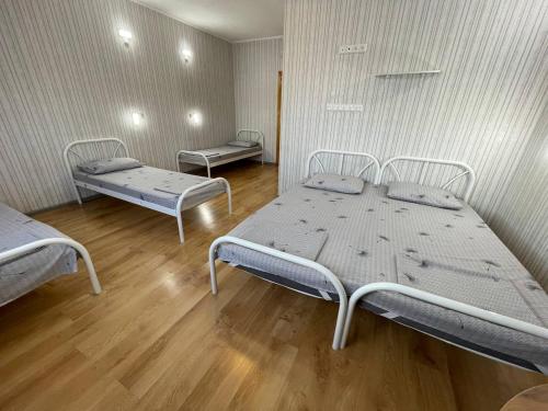 Postel nebo postele na pokoji v ubytování VIP hostel